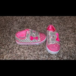 Size 9 Toddler sketchers twinkle toes.